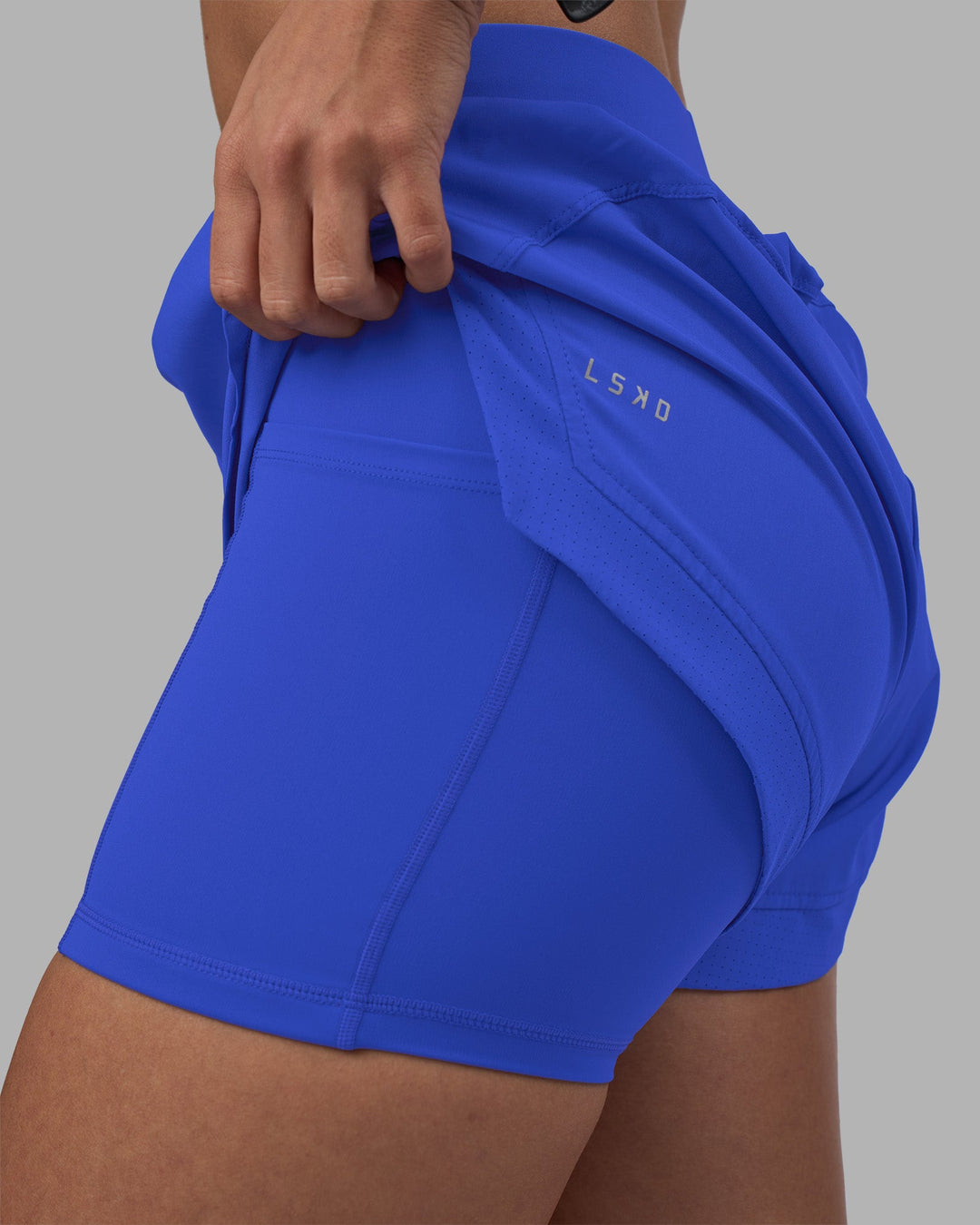 Woman wearing Challenger 3&quot; Lined Performance Short - Power Cobalt | Model:Rhiley | Size:S