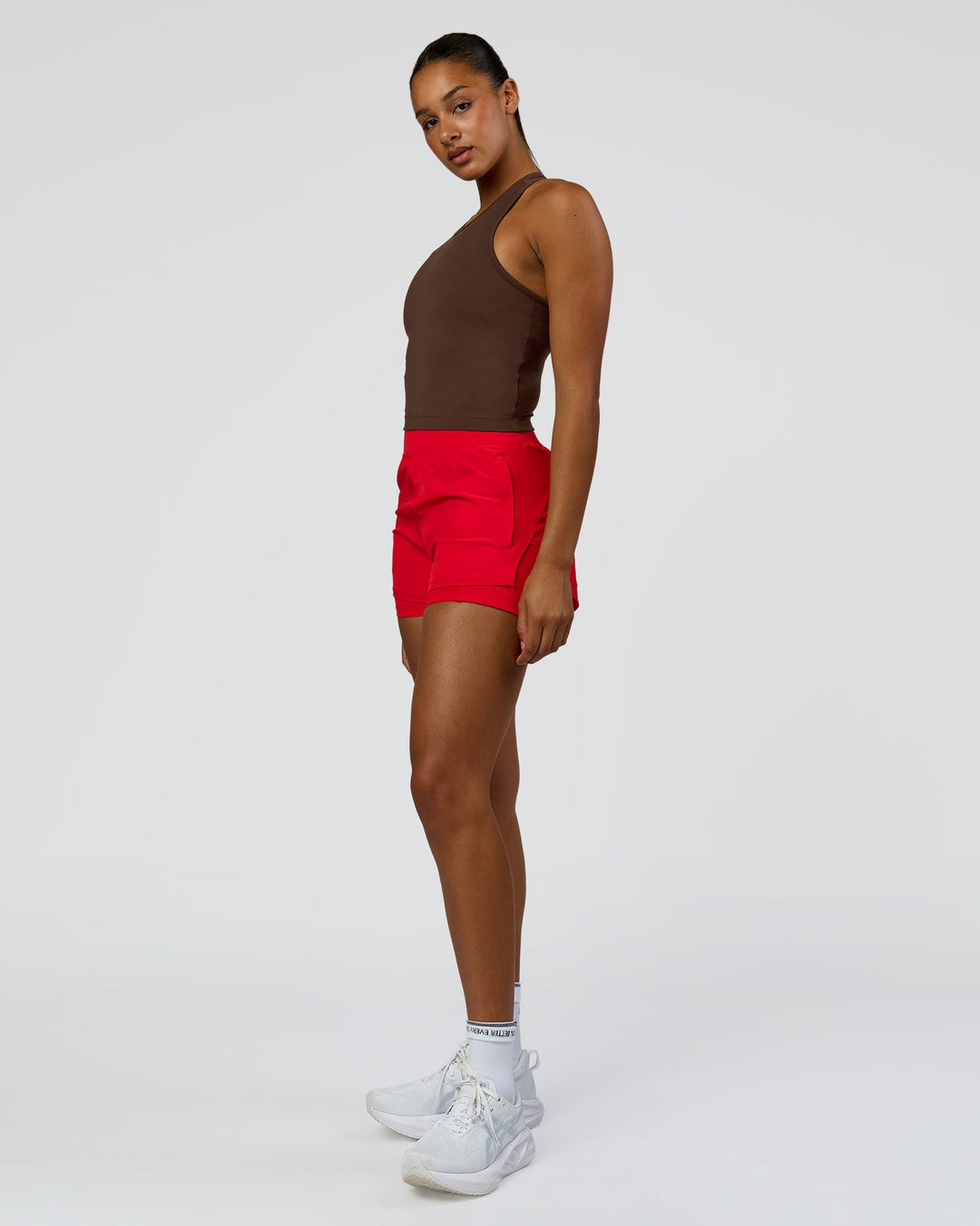 Woman wearing Challenger 3" Lined Performance Short - Scarlet | Model:Rosie | Size:S