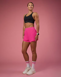 Woman wearing Challenger 3" Lined Performance Short - Ultra Pink | Model:Hannah | Size:S