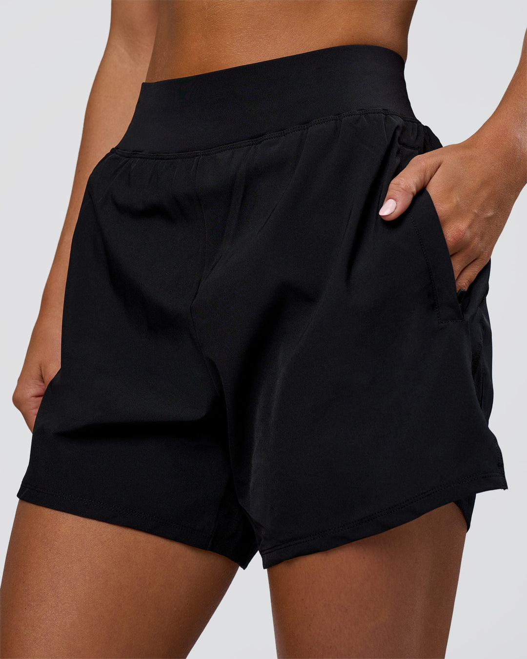 Woman wearing Challenger 5&quot; Lined Performance Short - Black | Model:Amity | Size:S