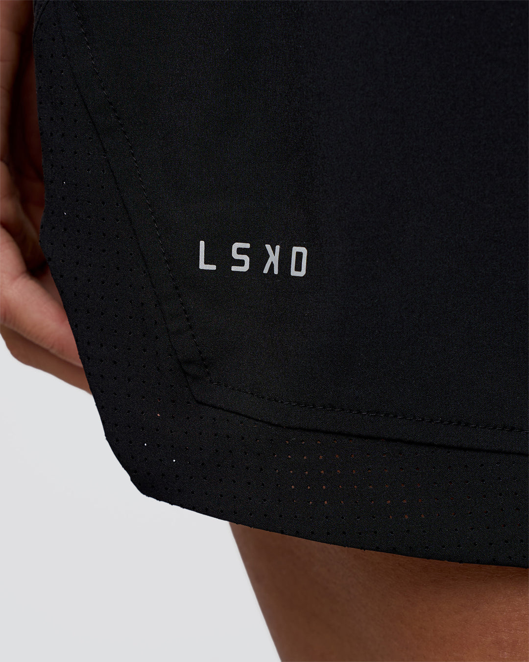 Woman wearing Challenger 5&quot; Lined Performance Short - Black | Model:Amity | Size:S