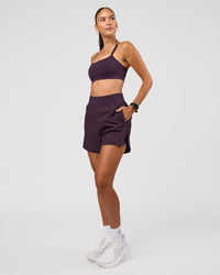 Woman wearing Challenger 5" Lined Performance Short - Midnight Plum | Model:Rhiley | Size:S