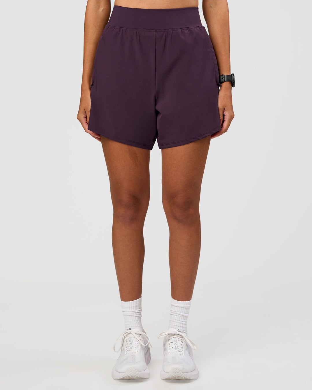 Woman wearing Challenger 5" Lined Performance Short - Midnight Plum | Model:Rhiley | Size:S