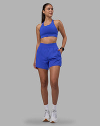 Woman wearing Challenger 5" Lined Performance Short - Power Cobalt | Model:Rhiley | Size:S