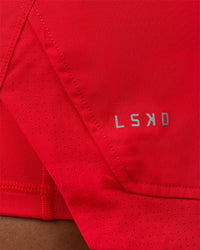 Woman wearing Challenger 5" Lined Performance Short - Scarlet | Model:Rosie | Size:S