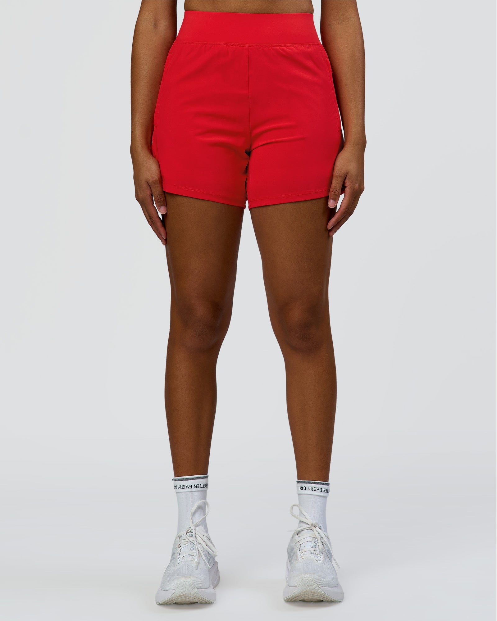 Woman wearing Challenger 5" Lined Performance Short - Scarlet | Model:Rosie | Size:S
