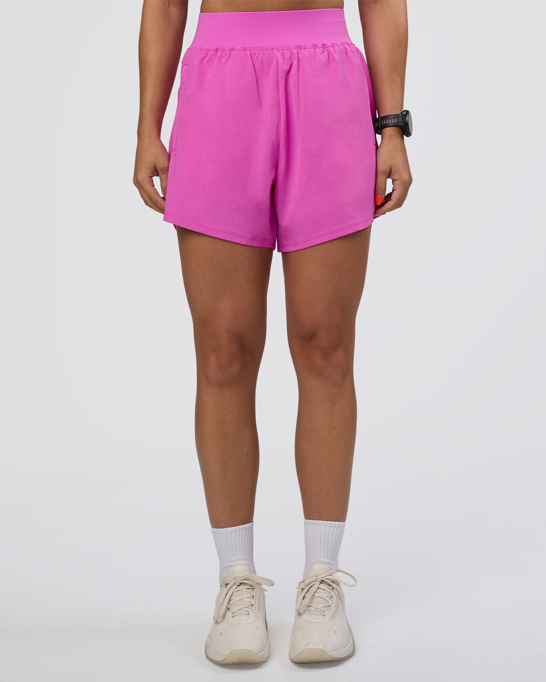 Woman wearing Challenger 5&quot; Lined Performance Short - Ultra Fuchsia | Model:Abbey | Size:S