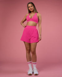 Woman wearing Challenger 5" Lined Performance Short - Ultra Pink | Model:Tianah | Size:S