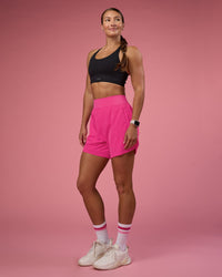 Woman wearing Challenger 5" Lined Performance Short - Ultra Pink | Model:Hannah  | Size:S