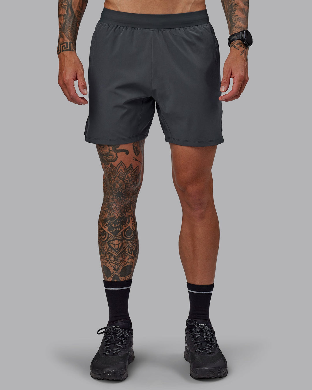 Man wearing Challenger 6&quot; Performance Short in Dark Storm | Size:S