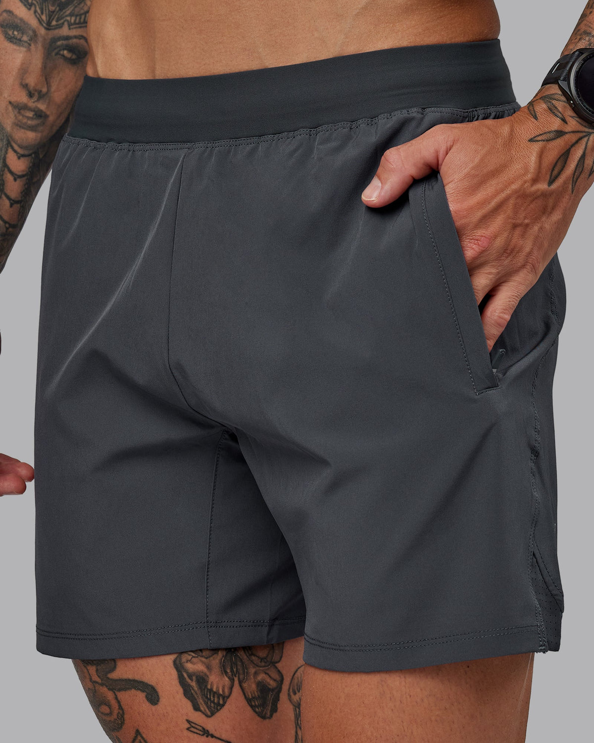 Man wearing Challenger 6" Performance Short in Dark Storm | Size:S - view 1