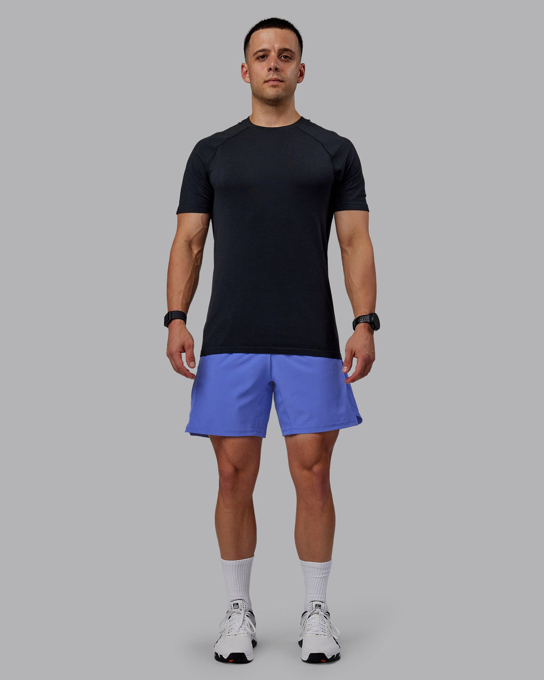 Man wearing Challenger 6&quot; Performance Shorts - Baja Blue