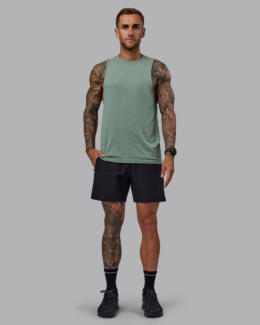 Man wearing Challenger 6&quot; Performance Shorts in Black | Size:S