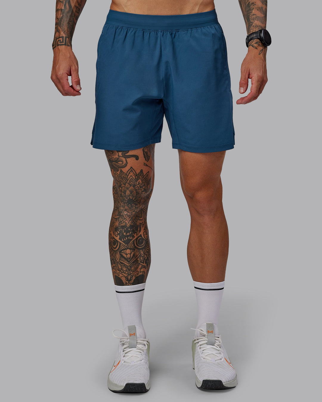 Man wearing Challenger 6&quot; Performance Short in Indigo | Size:S