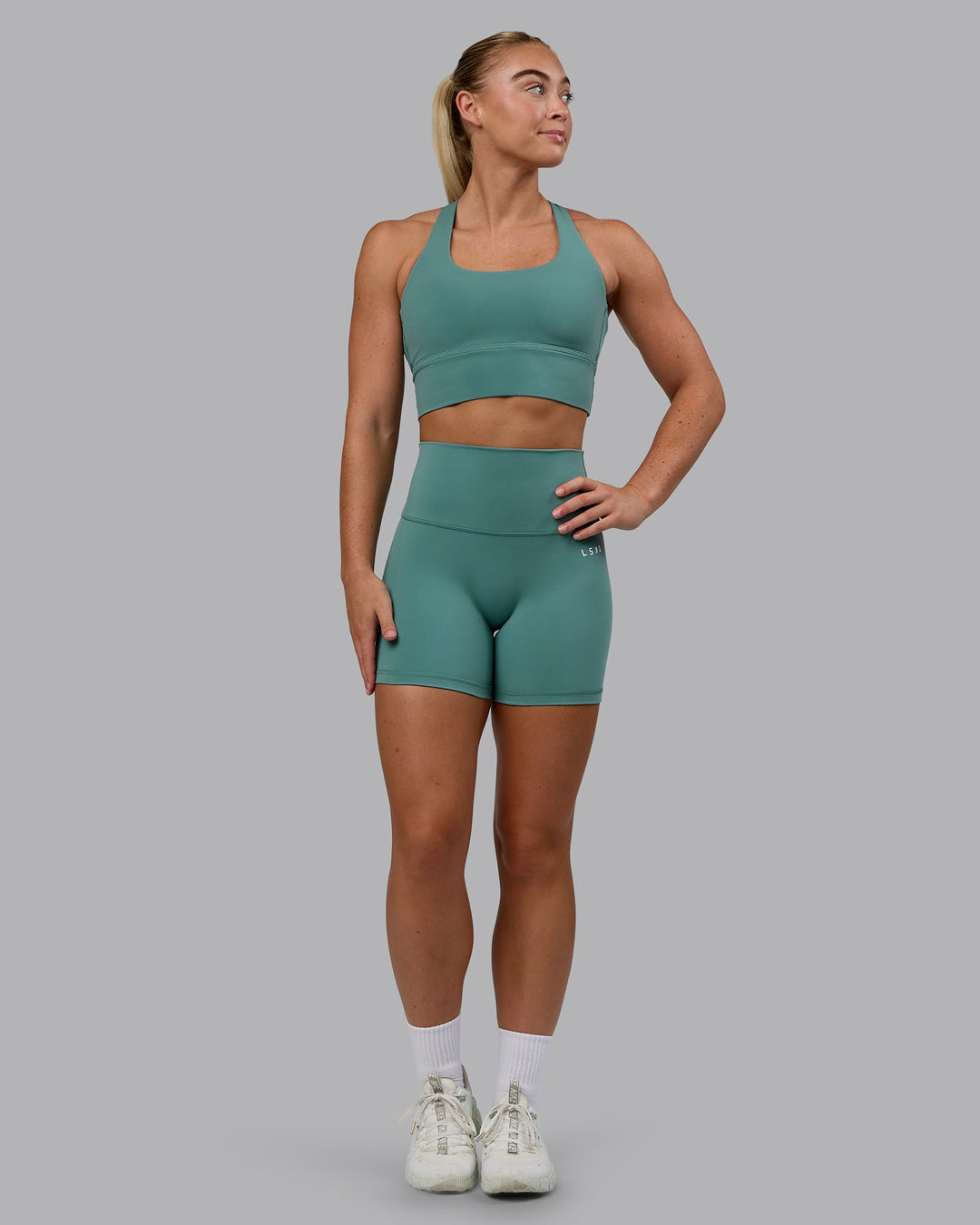 Woman wearing Circuit Sports Bra - Sagebrush