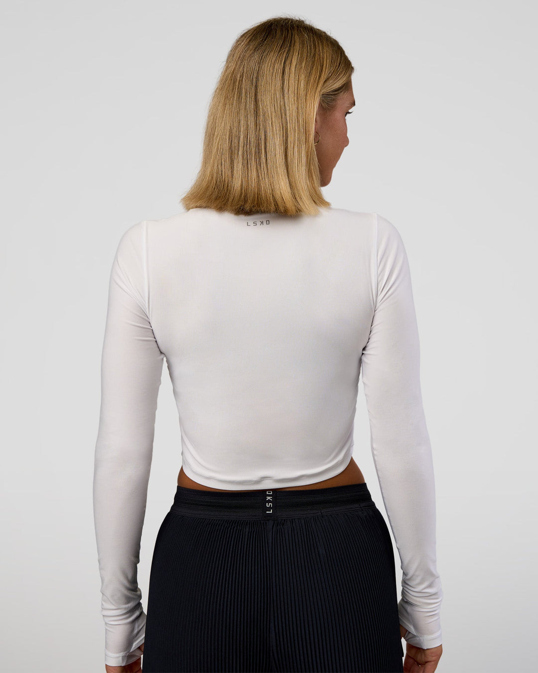 Woman wearing Clarity Long Sleeve Tee - White | Model:Amity | Size:S - view 4