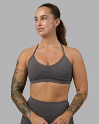 Woman wearing Clarity Sports Bra - Dark Storm | Model:Robyn | Size:S