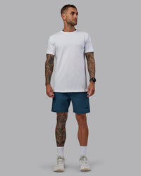 Man wearing Daily 7" Shorts - Indigo
