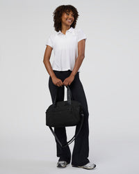 Woman wearing Drive Polo - White | Model:Tomi | Size:S | Thumbnail Index: 1