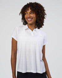 Woman wearing Drive Polo - White | Model:Tomi | Size:S | Thumbnail Index: 0