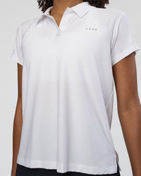 Woman wearing Drive Polo - White | Model:Tomi | Size:S | Thumbnail Index: 6