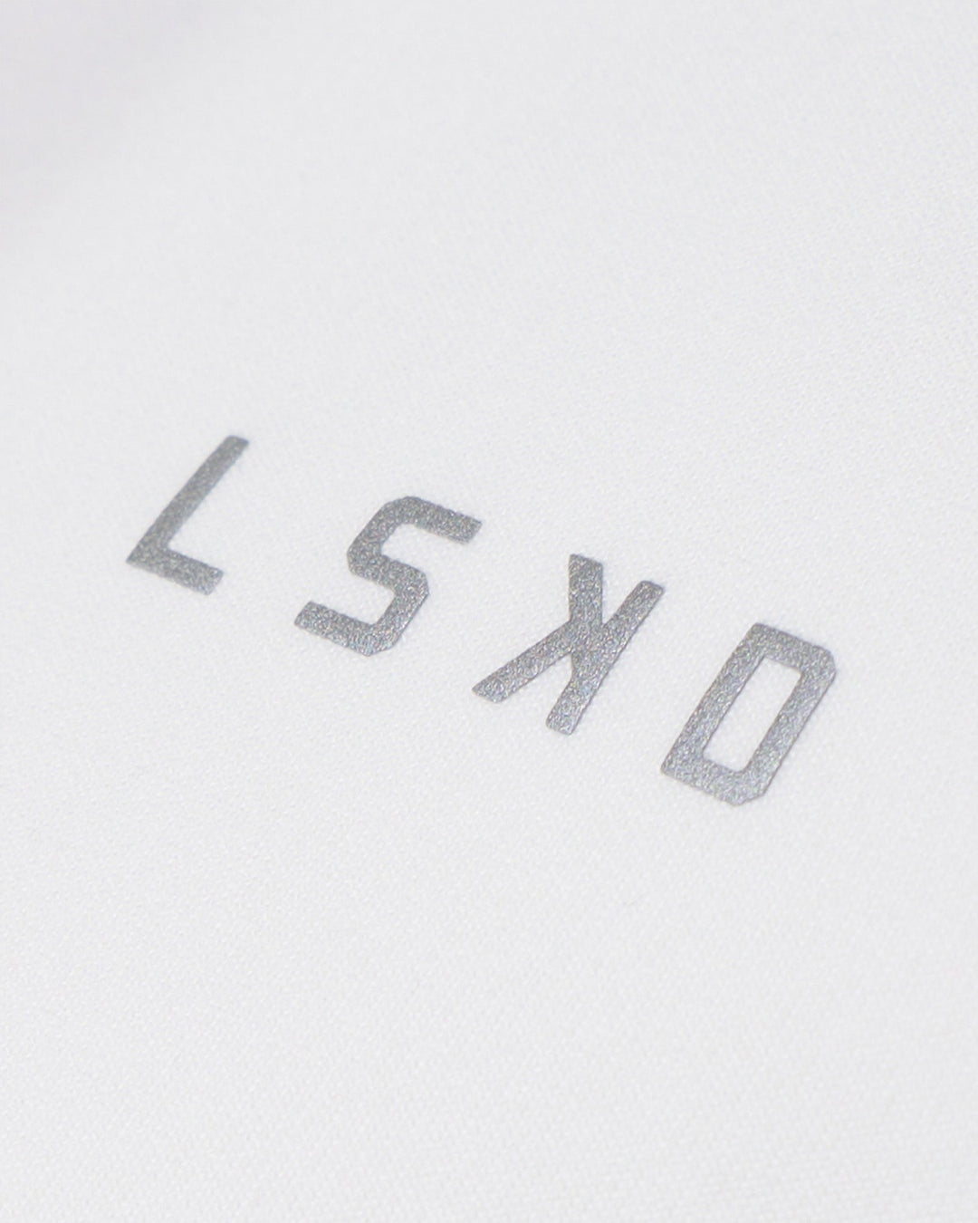 Woman wearing Drive Polo - White | Model:Tomi | Size:S