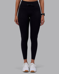 Woman wearing Effortless Drawstring Ultra High-Rise Full Length Legging Pockets - Black | Model:Rhiley | Size:S | Thumbnail Index: 1