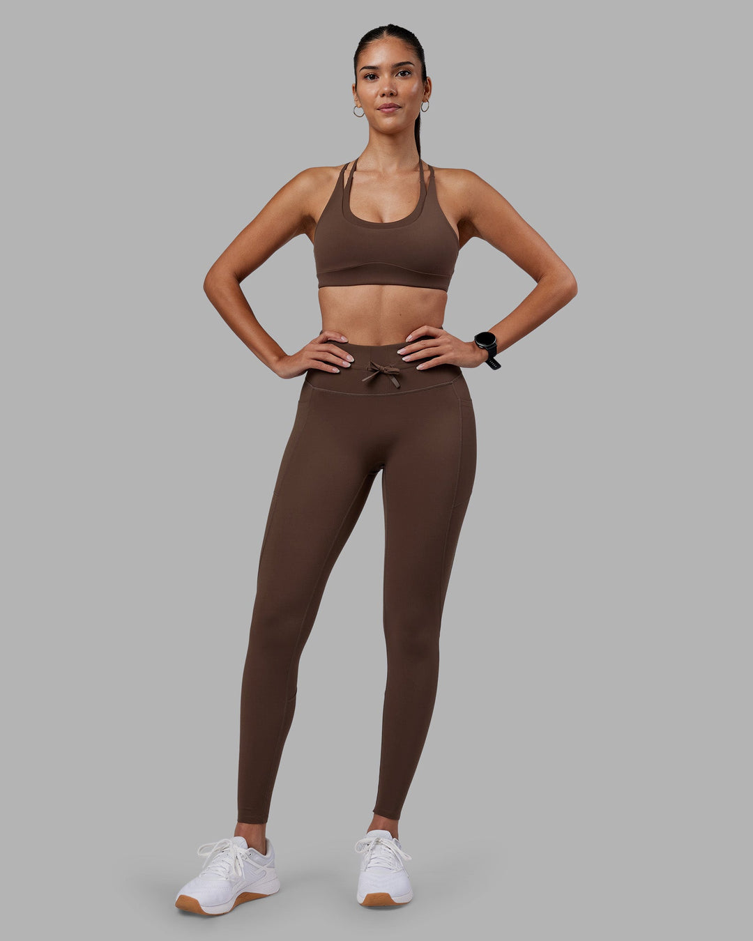 Woman wearing Effortless Drawstring Ultra High-Rise Full Length Legging Pockets - Chocolate Martini | Model:Rhiley | Size:S