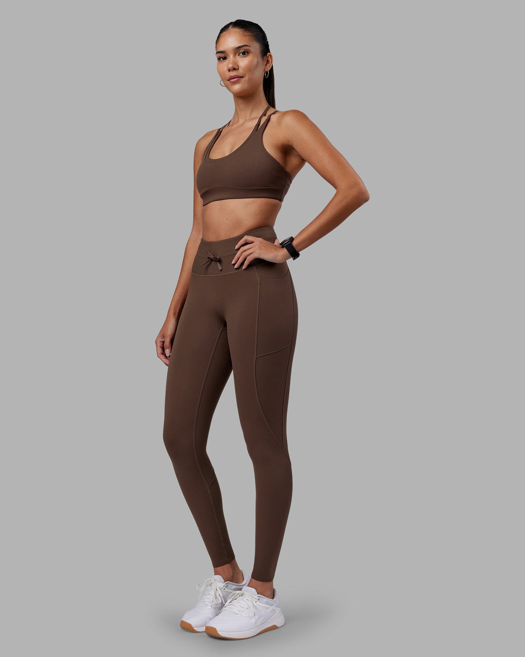 Woman wearing Effortless Drawstring Ultra High-Rise Full Length Legging Pockets - Chocolate Martini | Model:Rhiley | Size:S