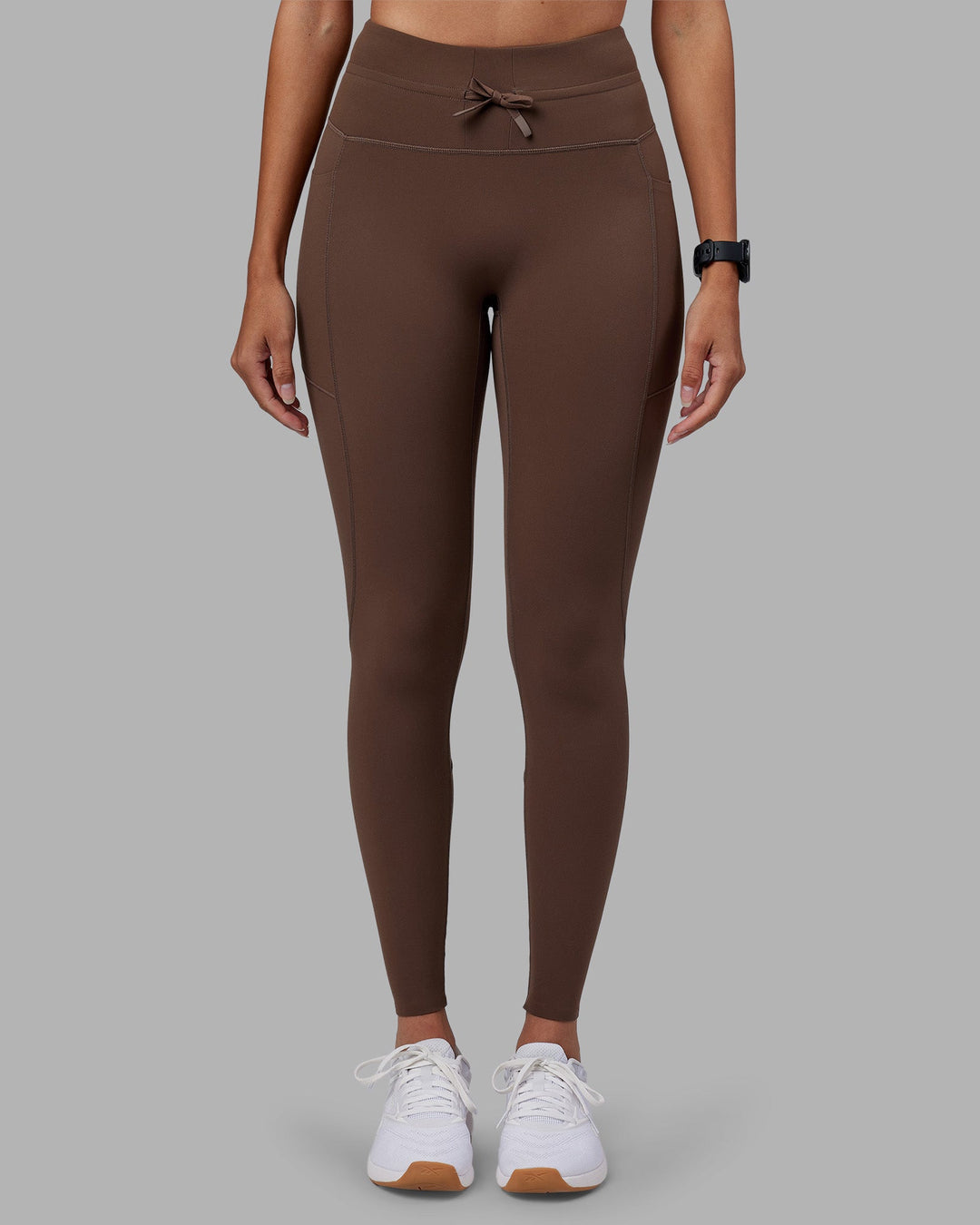 Woman wearing Effortless Drawstring Ultra High-Rise Full Length Legging Pockets - Chocolate Martini | Model:Rhiley | Size:S