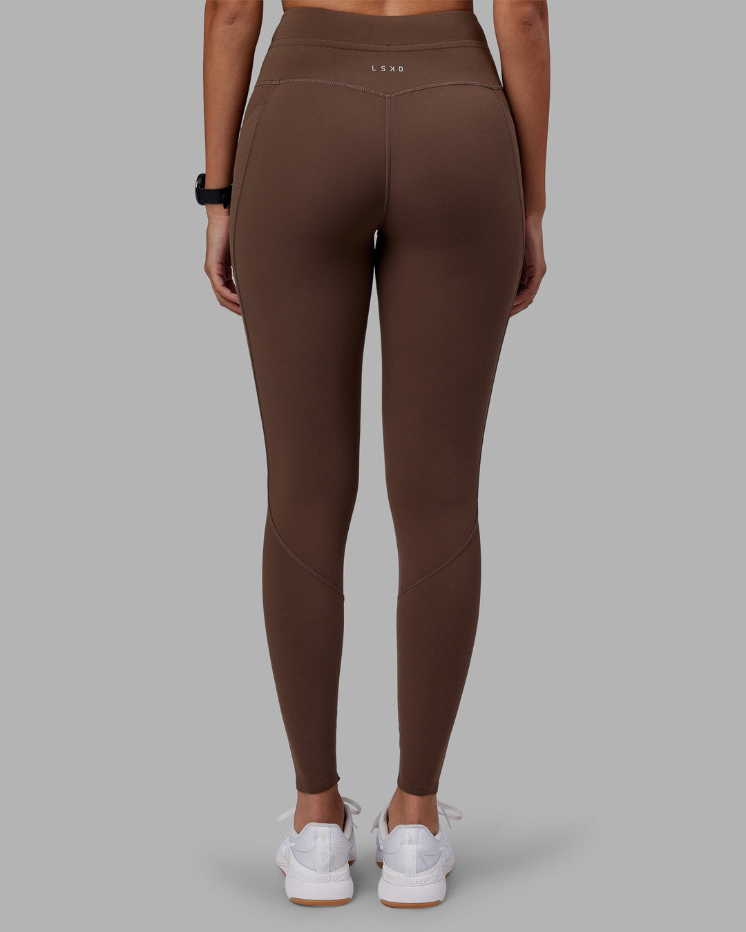 Woman wearing Effortless Drawstring Ultra High-Rise Full Length Legging Pockets - Chocolate Martini | Model:Rhiley | Size:S