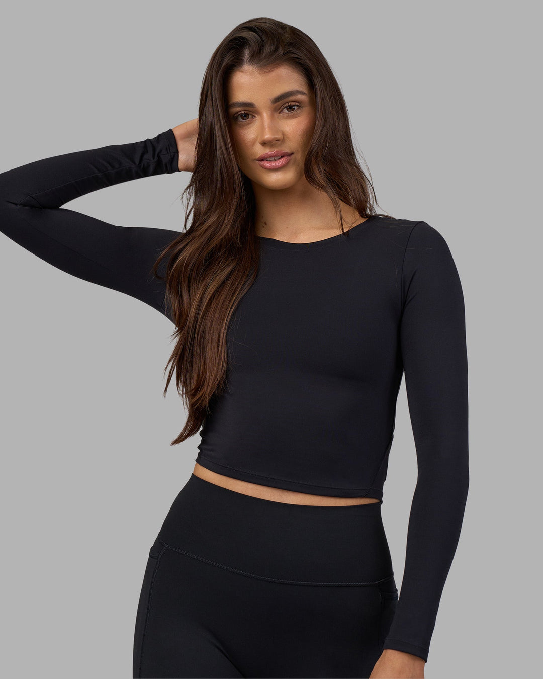 Woman wearing Effortless Long Sleeve Top - Black | Model:Phoebe | Size:S