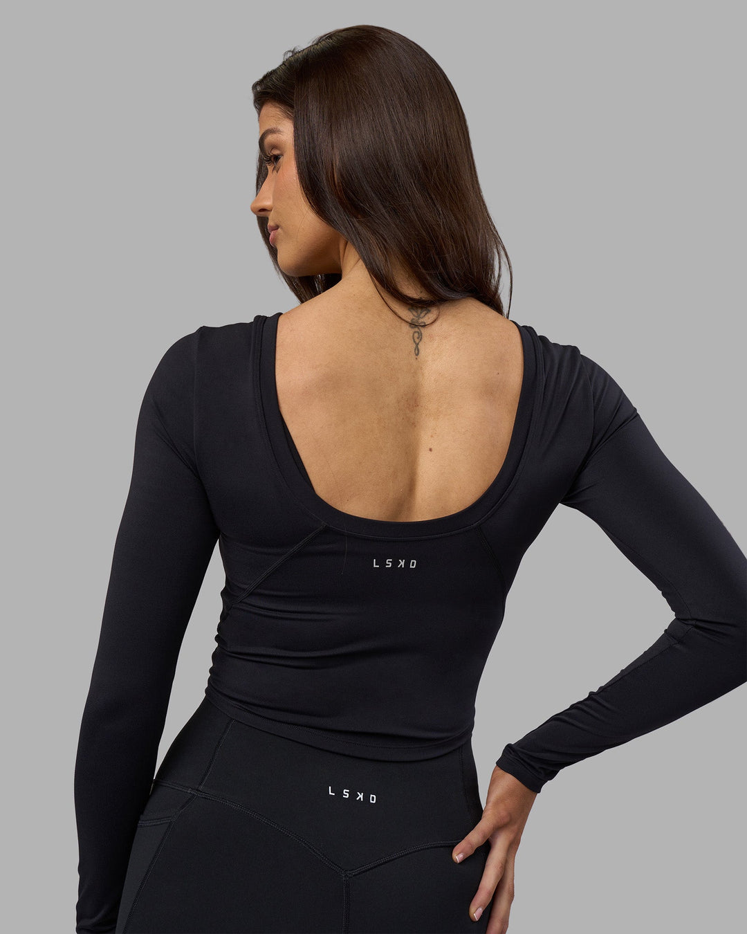 Woman wearing Effortless Long Sleeve Top - Black | Model:Phoebe | Size:S