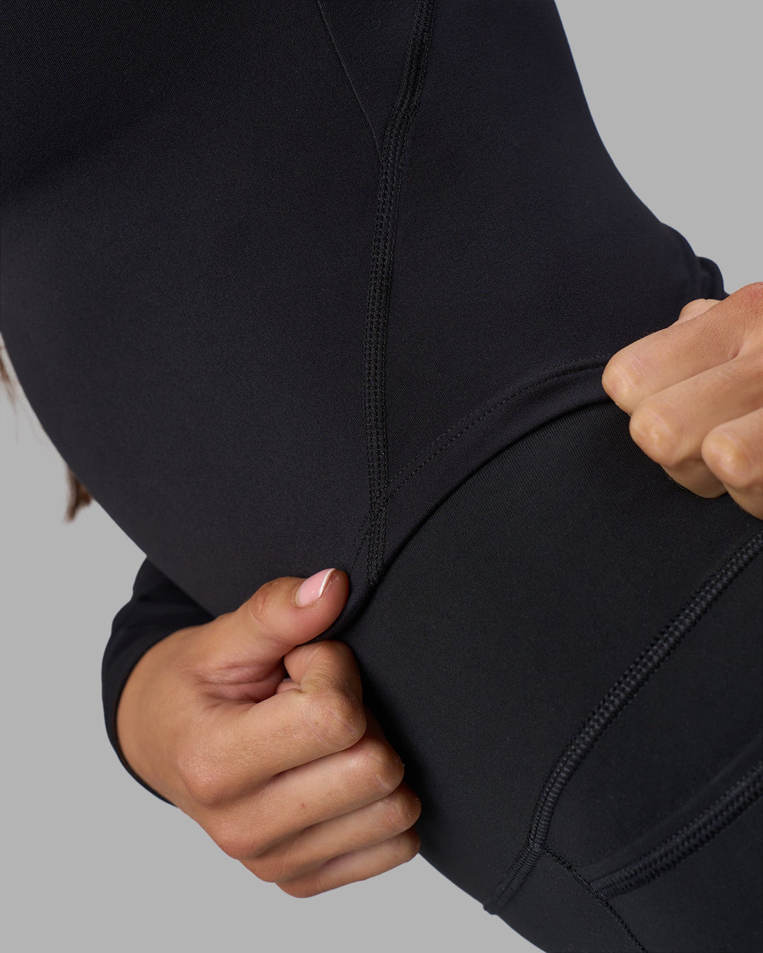 Woman wearing Effortless Long Sleeve Top - Black | Model:Phoebe | Size:S