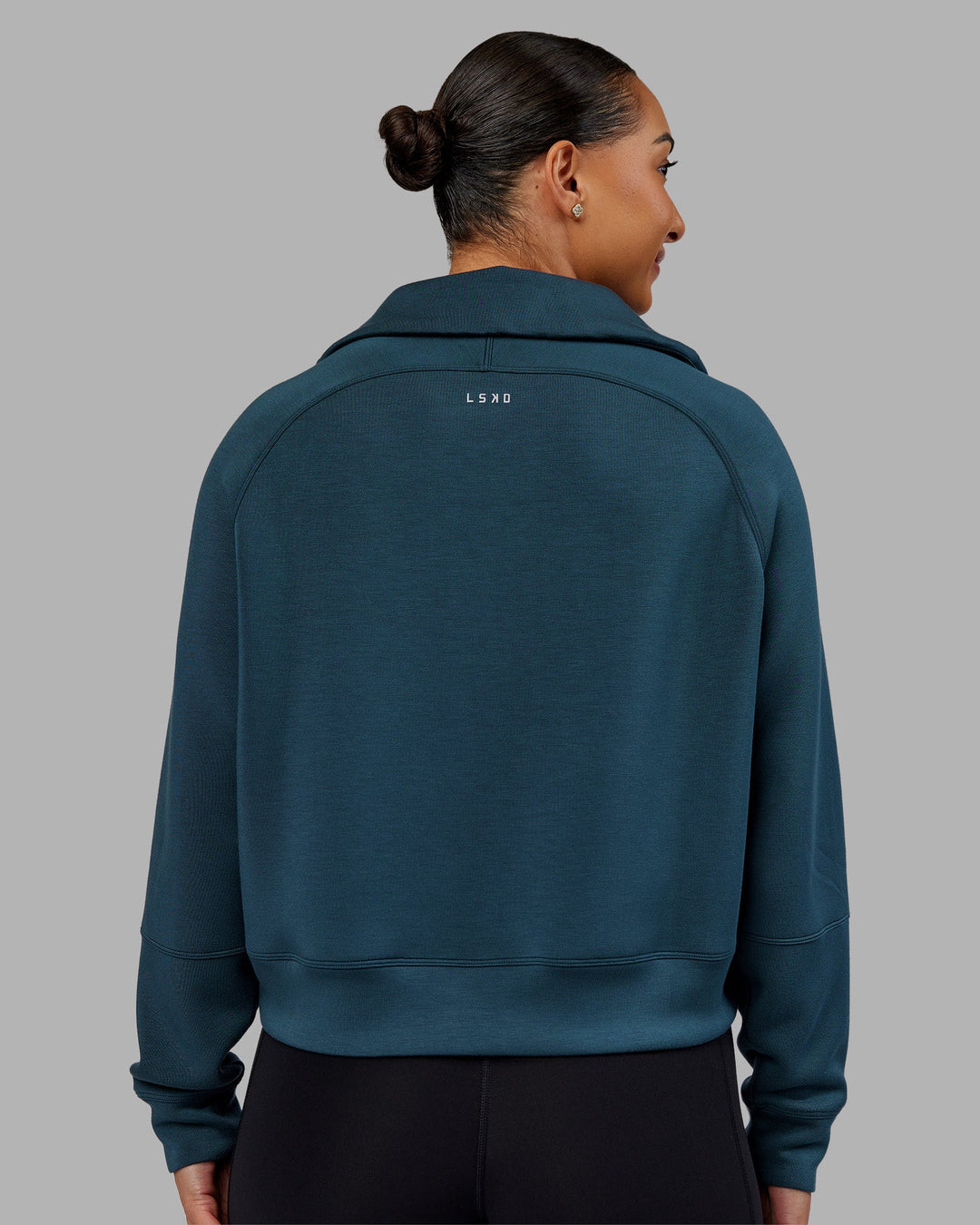 Woman wearing Elevate SoftTouch 1/2 Zip Sweater - Deep Sea | Model:Ayla | Size:S