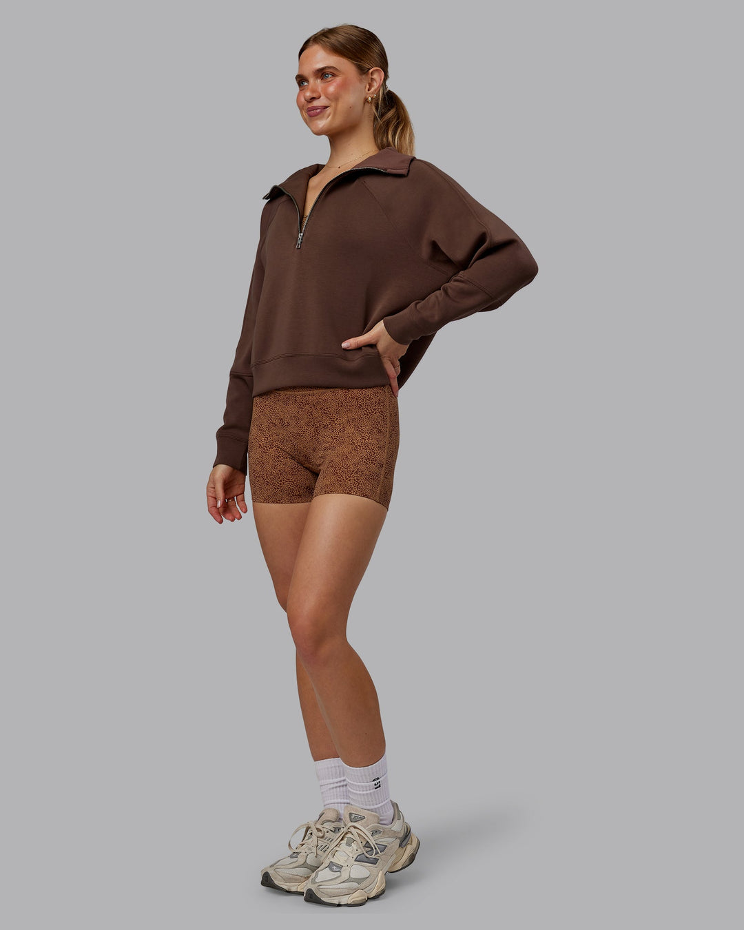 Woman wearing Elevate SoftTouch 1/2 Zip Sweater - Chocolate Martini | Model:Emilie | Size:S