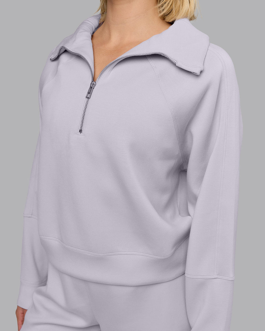 Woman wearing Elevate SoftTouch 1/2 Zip Sweater - Galactic Lilac | Model:Halle | Size:S