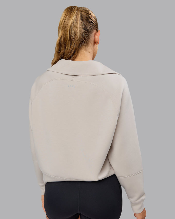 Woman wearing Elevate SoftTouch 1/2 Zip Sweater in Shale Beige | Size:S
