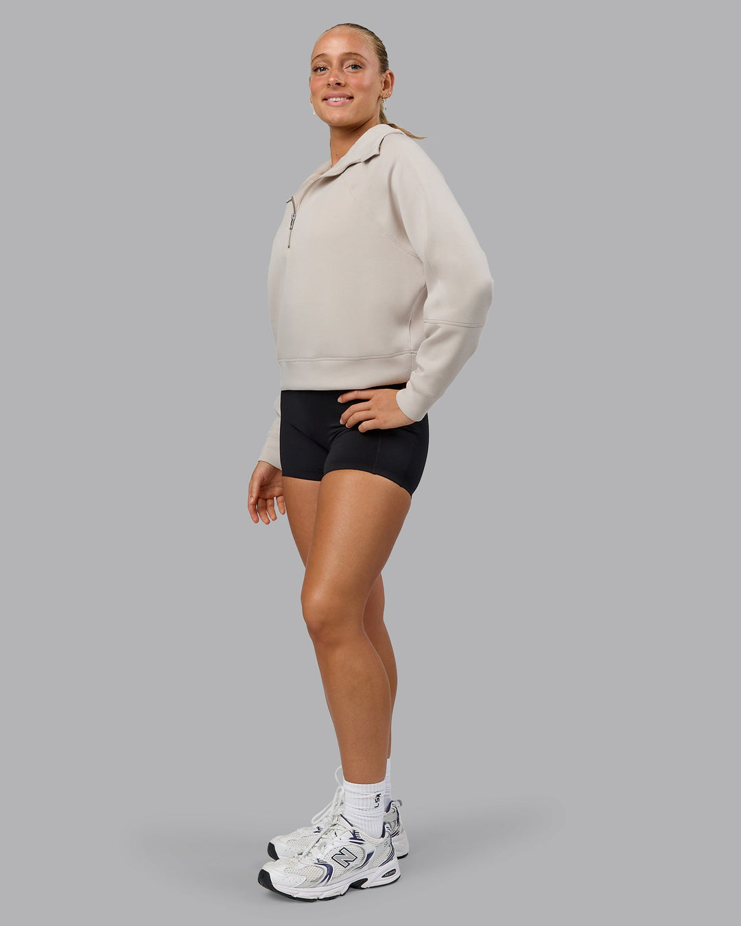 Woman wearing Elevate SoftTouch 1/2 Zip Sweater in Shale Beige | Size:S