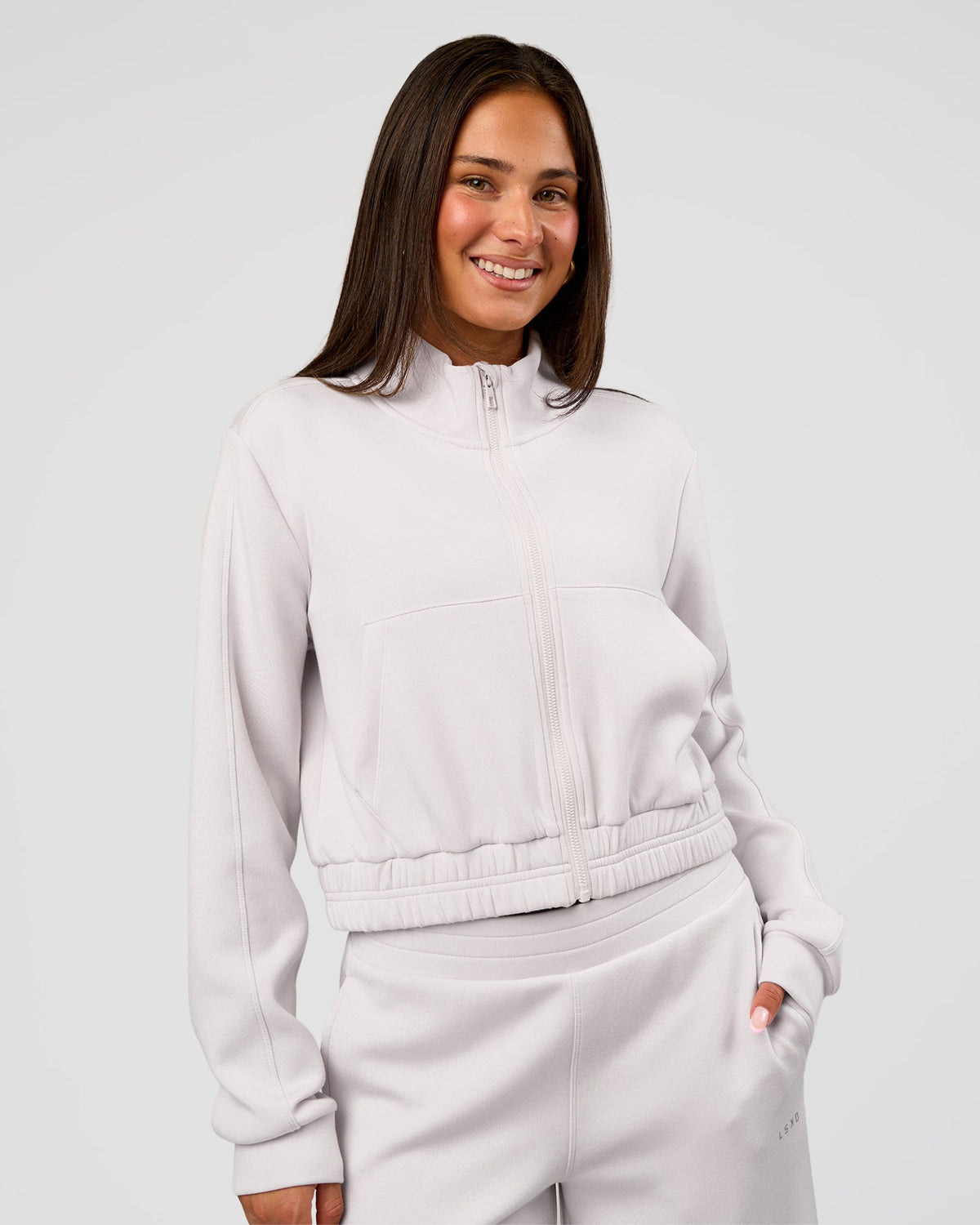 Woman wearing Elevate SoftTouch Cropped Full Zip Jacket - Clay | Model:Bianca | Size:S - view 1