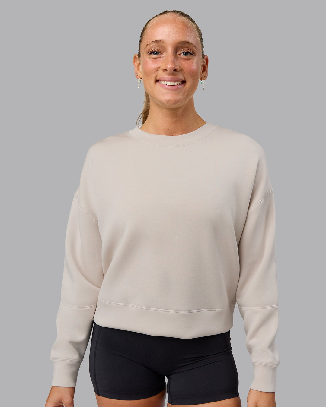 Woman wearing Elevate SoftTouch Crew Neck Sweater in Shale Beige | Size:S