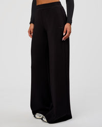 Woman wearing Elevate SoftTouch Wide Leg Pant Tall - Black | Model:Bianca | Size:S | Thumbnail Index: 0