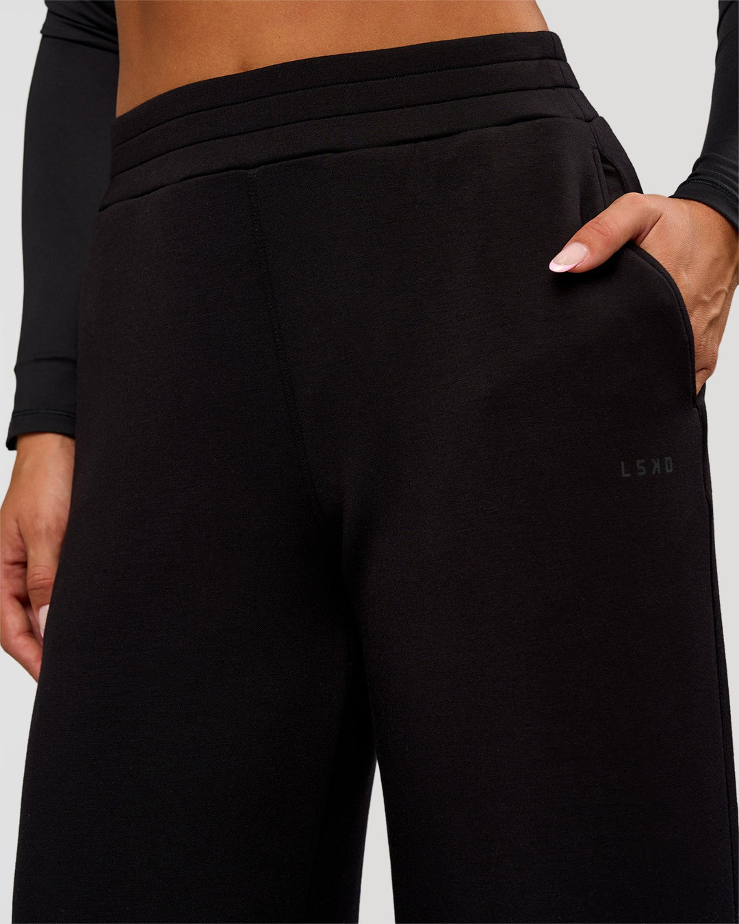 Woman wearing Elevate SoftTouch Wide Leg Pant Tall - Black | Model:Bianca | Size:S - view 3