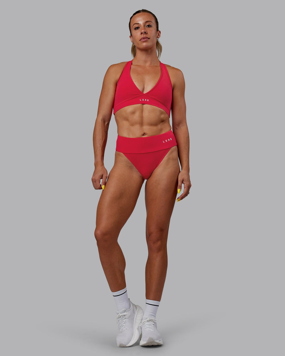 Woman wearing Elevate Sprinting Briefs - Scarlet