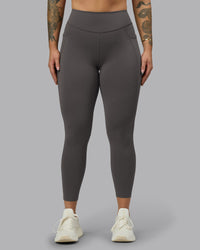 Woman wearing Elite High-Rise 7/8 Legging Pockets - Dark Storm | Model:Robyn | Size:S | Thumbnail Index: 3