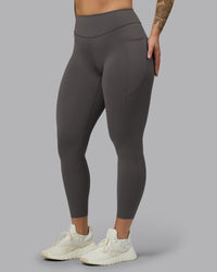Woman wearing Elite High-Rise 7/8 Legging Pockets - Dark Storm | Model:Robyn | Size:S | Thumbnail Index: 7