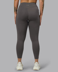 Woman wearing Elite High-Rise 7/8 Legging Pockets - Dark Storm | Model:Robyn | Size:S | Thumbnail Index: 4