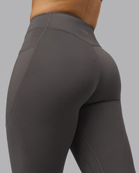 Woman wearing Elite High-Rise 7/8 Legging Pockets - Dark Storm | Model:Robyn | Size:S | Thumbnail Index: 8