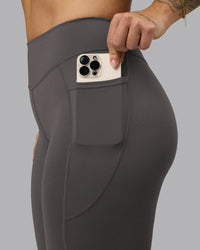 Woman wearing Elite High-Rise 7/8 Legging Pockets - Dark Storm | Model:Robyn | Size:S | Thumbnail Index: 5
