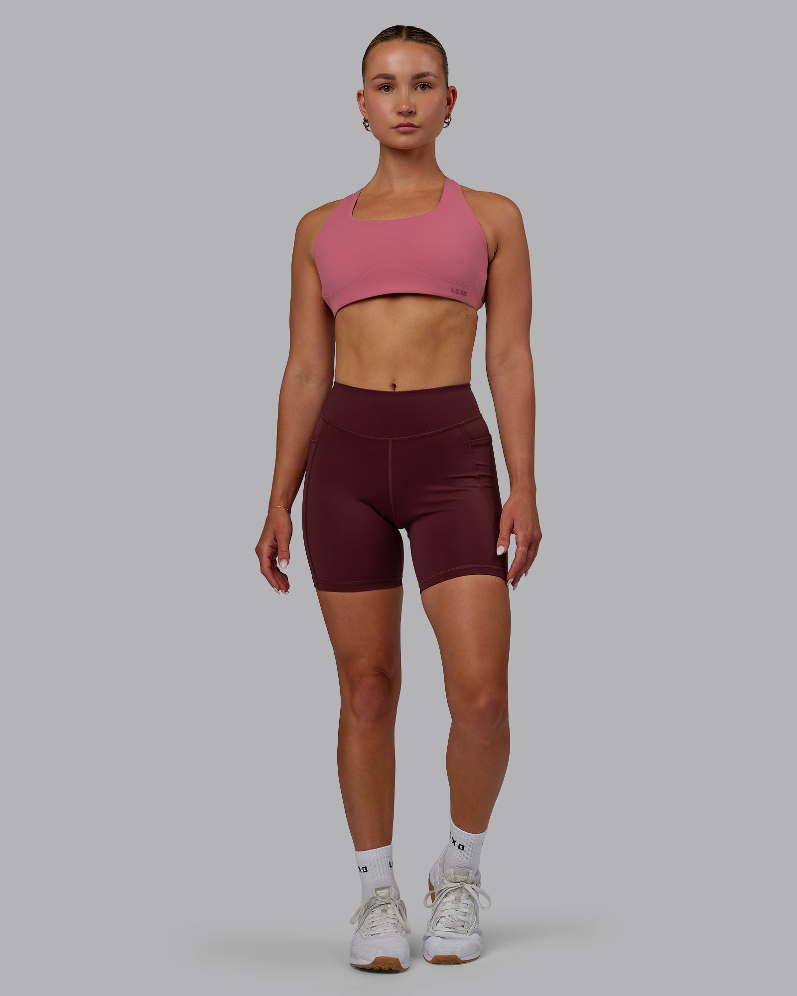 Woman wearing Elite High-Rise 6" Short Pockets - Dark Cherry